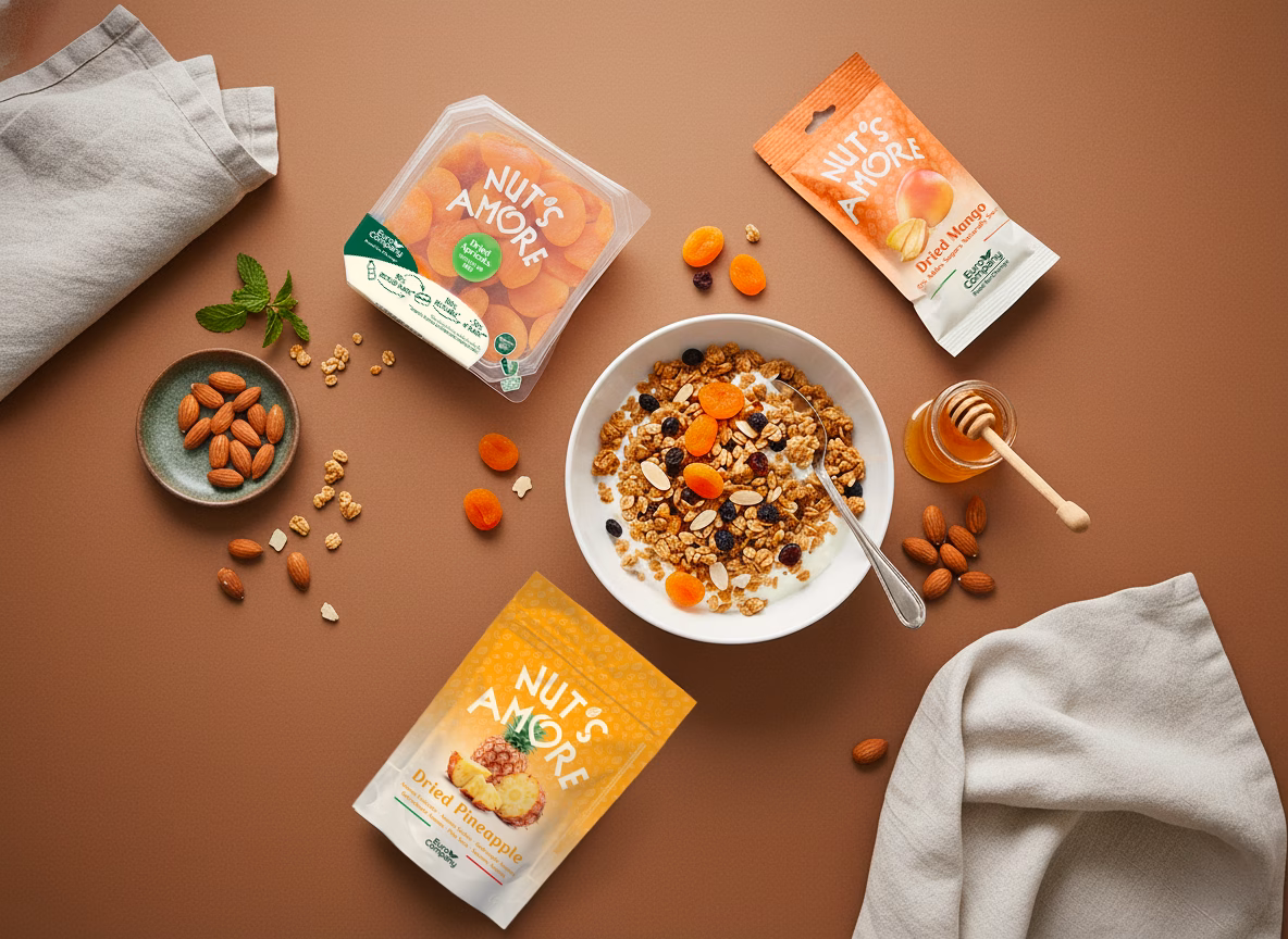 Breakfast setup with Nuts Amore dried apricot/mango/pineapple packages, granola, and honey.